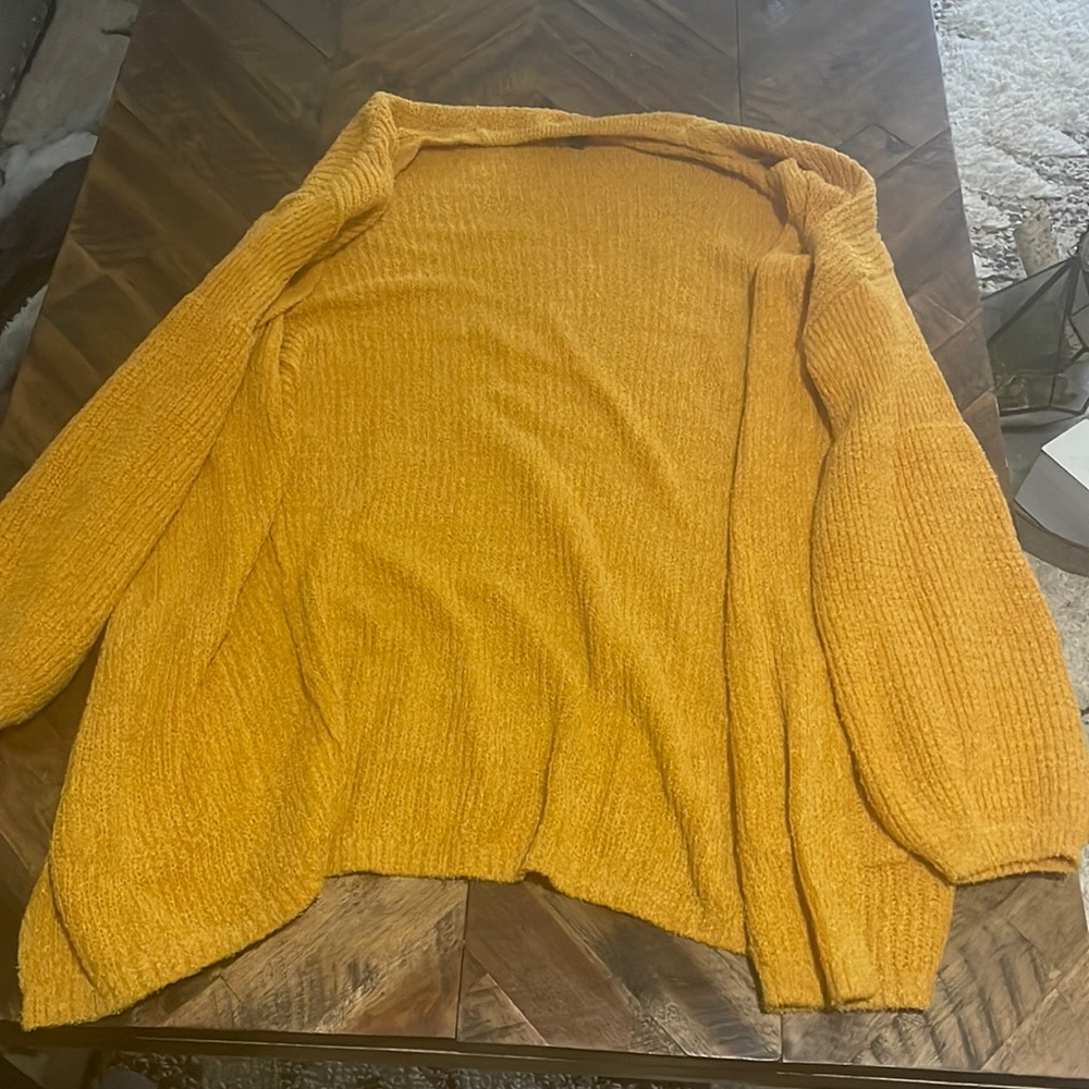 Women’s sweater mustard in color small in size
